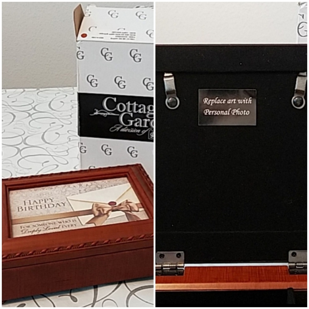 Musical jewelry box with interchangeable photo.